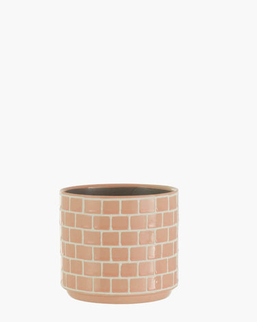 Pink flowerpot with wall effect design. on white background