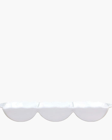White ceramic serving dish with 3 compartments on white background
