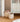 Hand woven natural and white basket in lifestyle photo