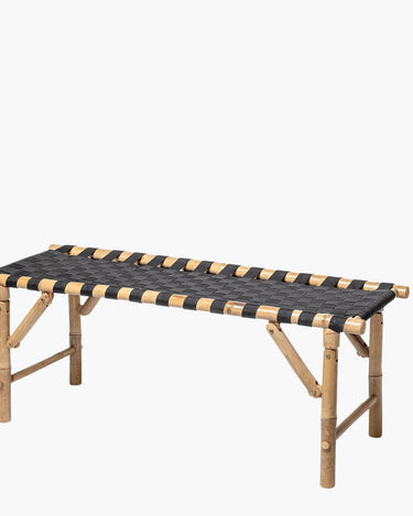 Bamboo wooden bench with black top on white background