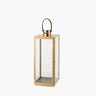 Gold Lantern with glass panels and leather strap for carrying on white background
