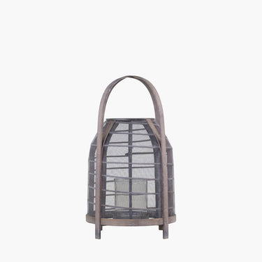 Wood and wicker mesh lantern with glass candle insert on white background