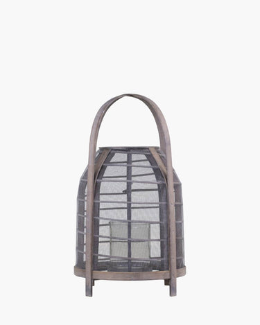 Wood and wicker mesh lantern with glass candle insert on white background