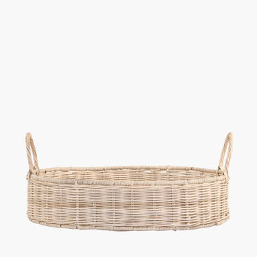 Round wicker basket with handles on white background