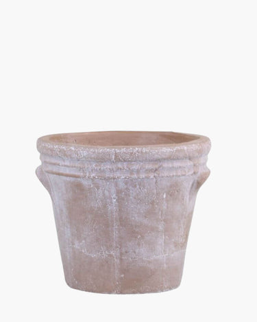 Terracotta pot with rustic edges on white background