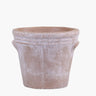 Terracotta flower pot with rustic grooves on a white background