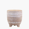Terracotta flower pot with etched design on 3 feet on white background