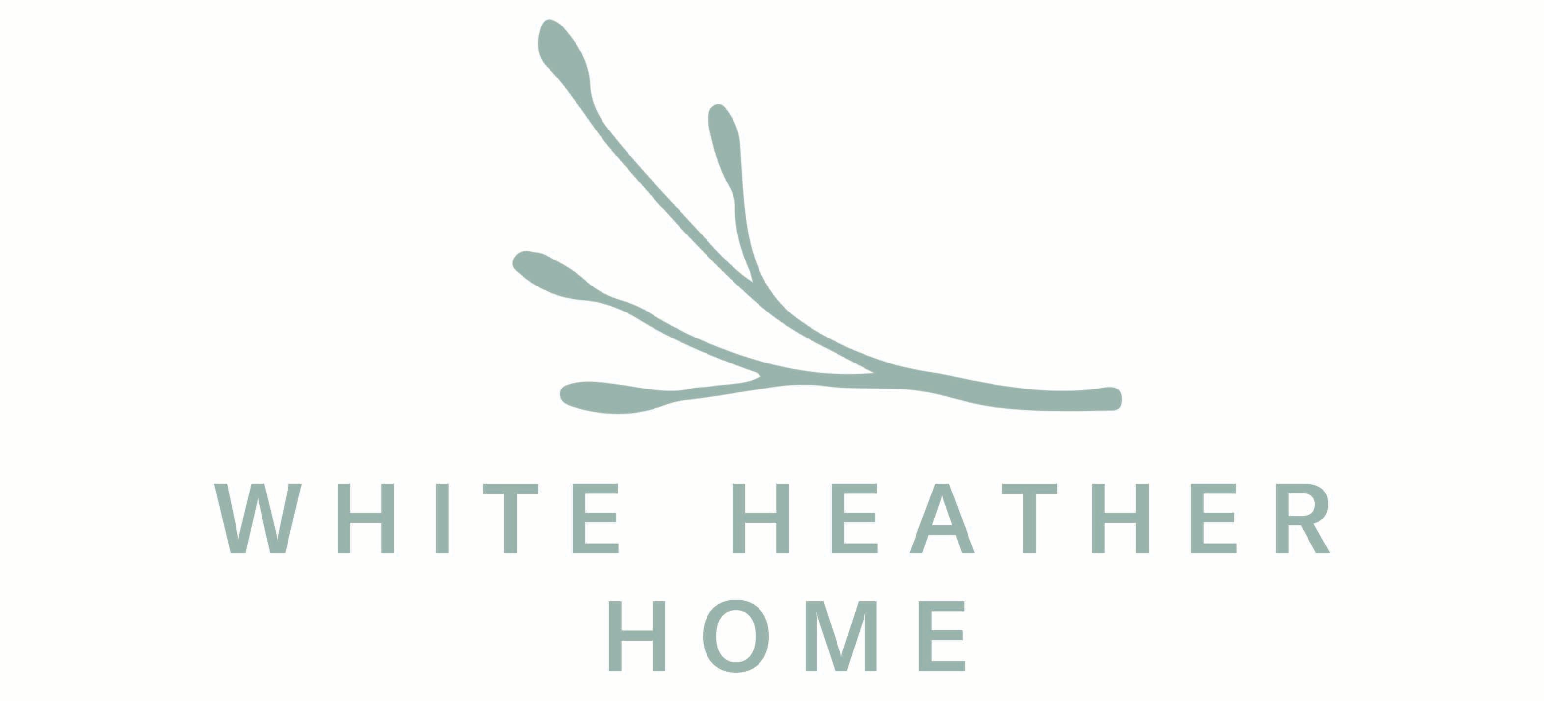 Logo of White Heather Home on white background
