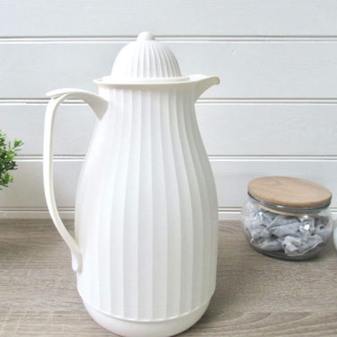 white Thermos teapot in lifestyle photo