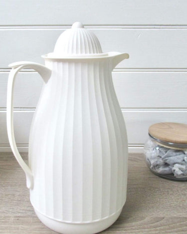 white Thermos teapot in lifestyle photo