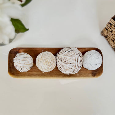 Styling balls in lifestyle photo on acia tray
