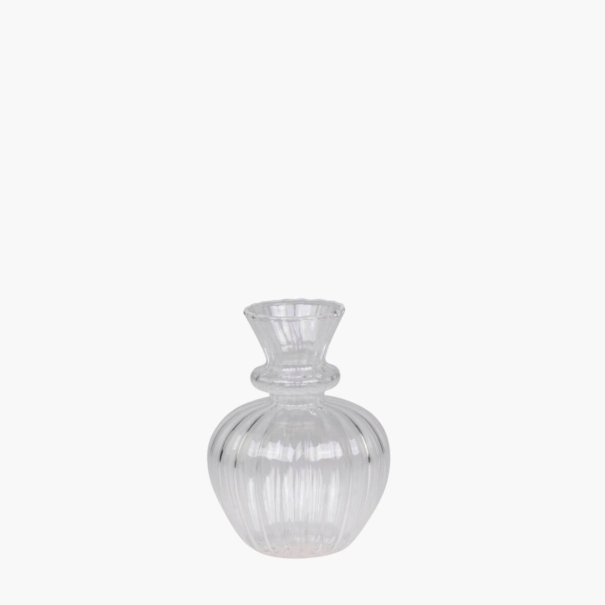 Glass bud vase with etched design on white background