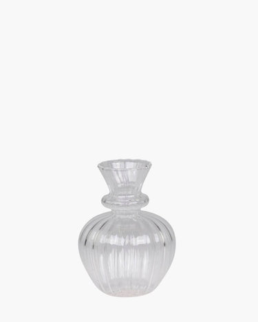 Glass bud vase with etched design on white background