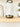 Glass and bronze candle holder on lifestyle background