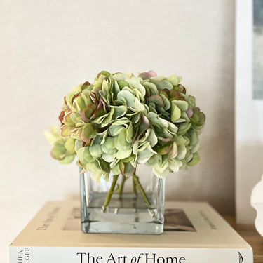 FAUX HYDRANGEA ARRANGEMENT IN CUBED GLASS (GREEN)