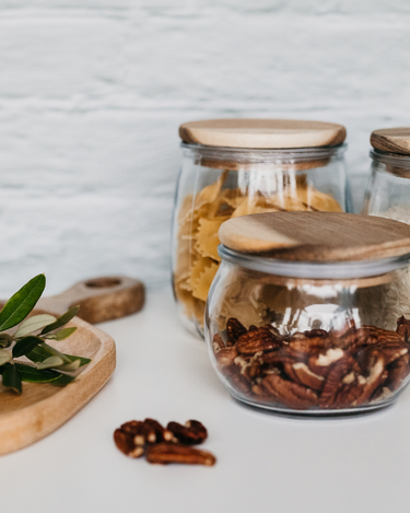 Large glass storage jar with Acia lid with grip in lifestyle photo
