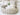 Round wicker basket with handles on lifestyle background