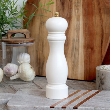 Salt/pepper Mill in cream/white in lifestyle photo
