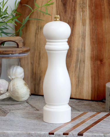 Salt/pepper Mill in cream/white in lifestyle photo
