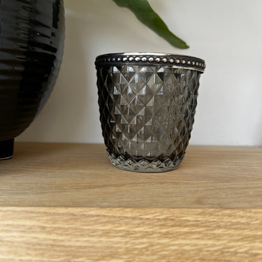 smoked glass tealight holder with silver pearl edge in lifestyle photo