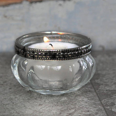 Glass tealight holder with silver pearl edge in lifestyle photo