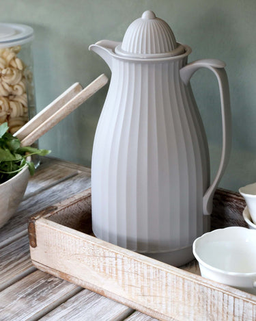 Thermos teapot in grey in lifestyle photo