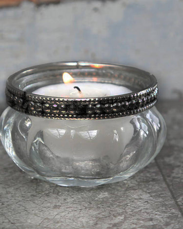 Glass tealight holder with silver pearl edge in lifestyle photo
